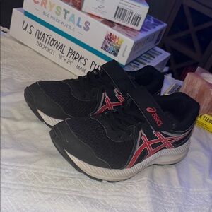 Asics Black and Red Sneakers with Modern Athletic Design